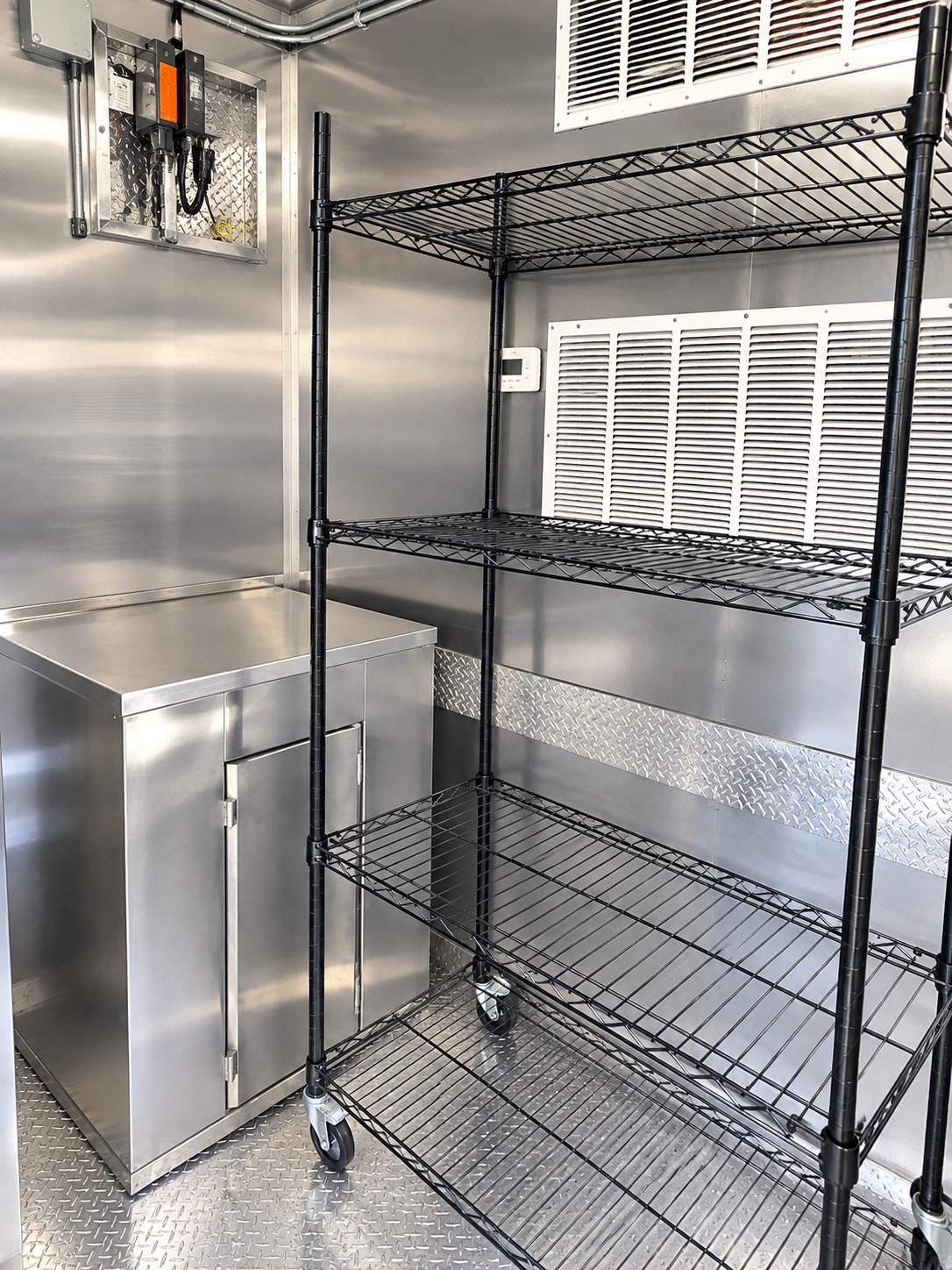 Commercial cooking line inside a bulk kitchen trailer