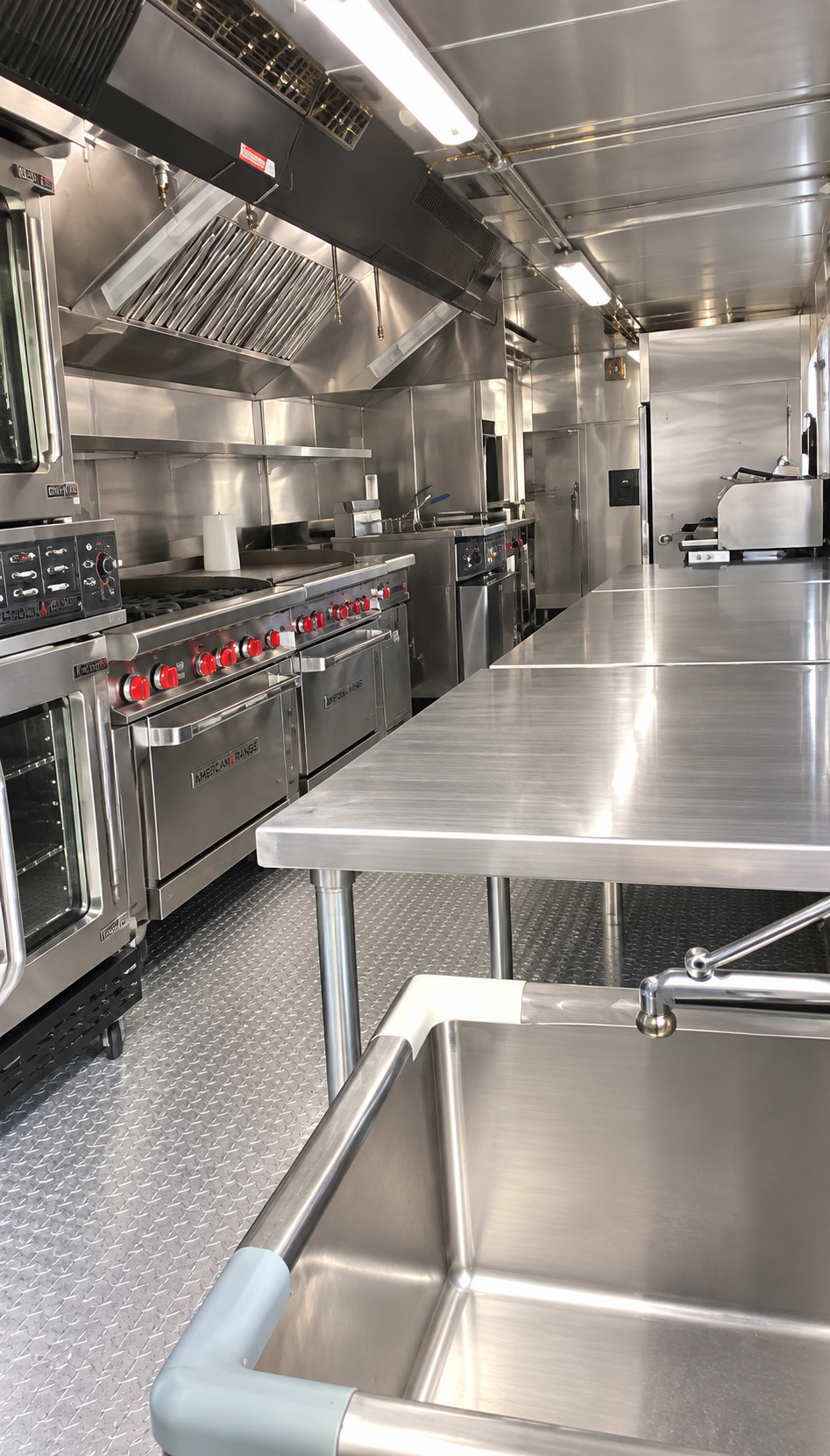 Cooking and preparation area inside a commercial kitchen trailer